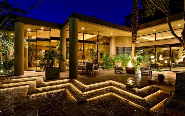 3 Mozart Lane Rancho Mirage, CA 92270 - Photo 20 of 41 a building outdoor space with patio furniture and glass windows