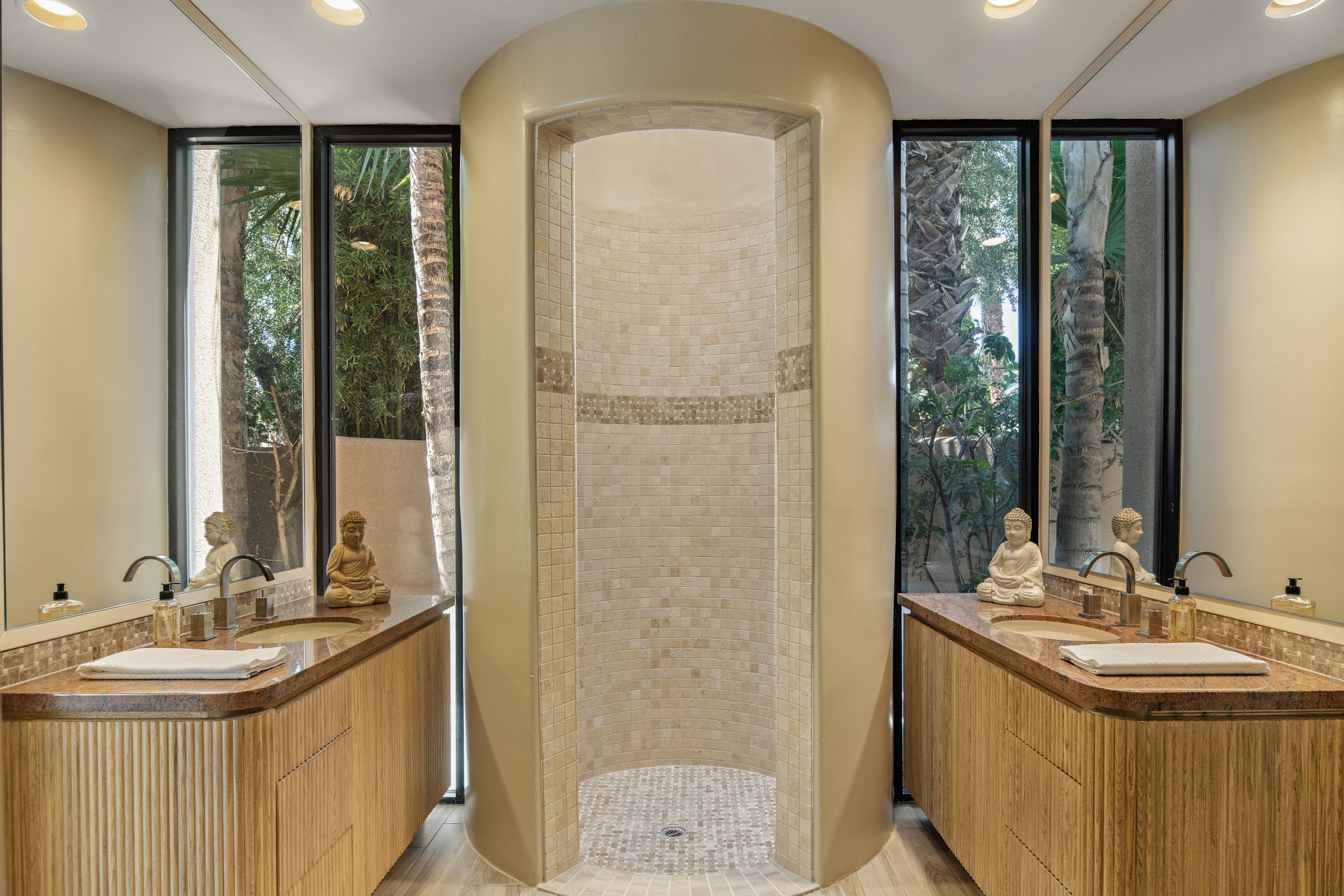 3 Mozart Lane Rancho Mirage, CA 92270 - Photo 21 of 41 a bathroom with a sink and a mirror