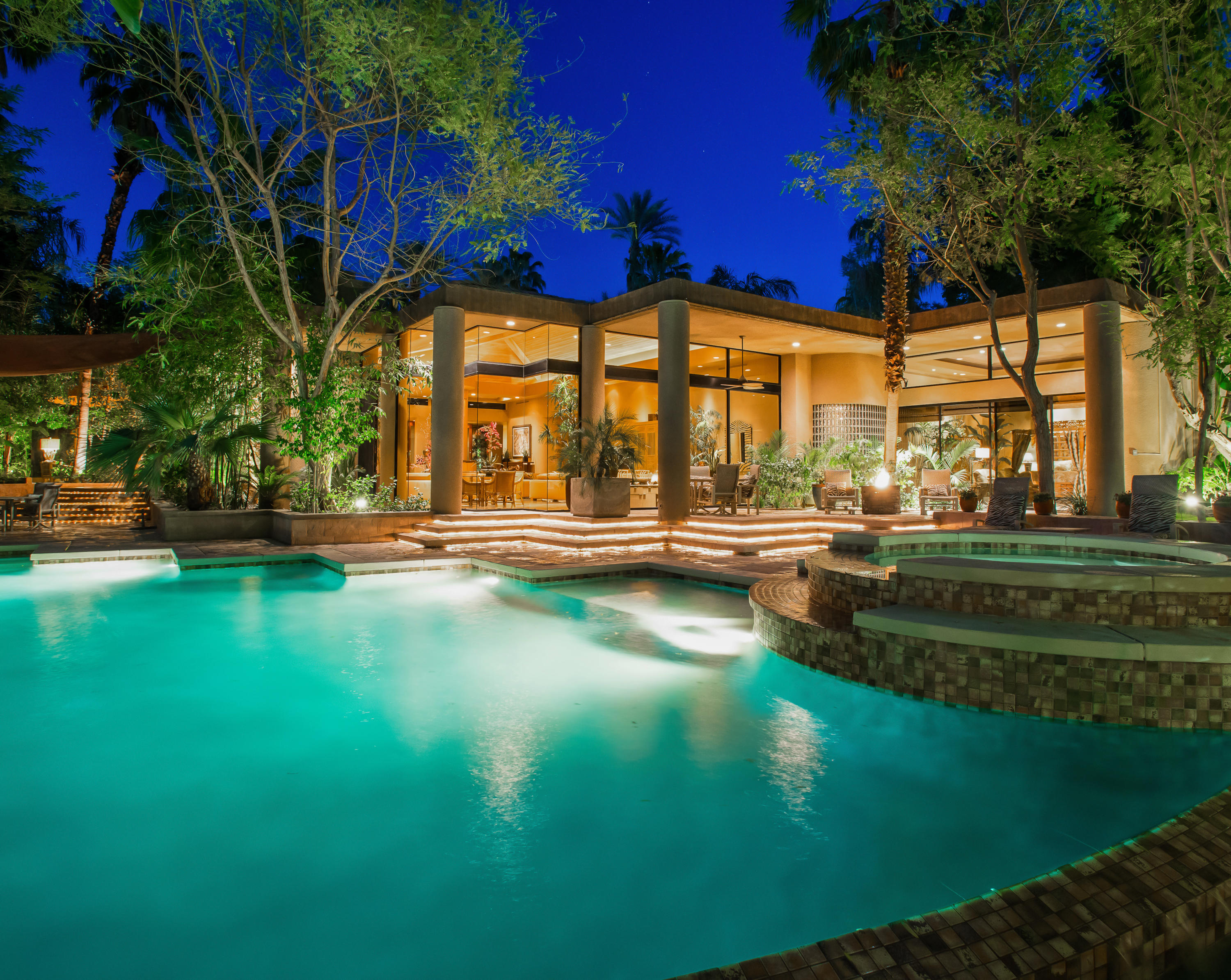 3 Mozart Lane Rancho Mirage, CA 92270 - Photo 40 of 41 a view of a swimming pool with an outdoor seating