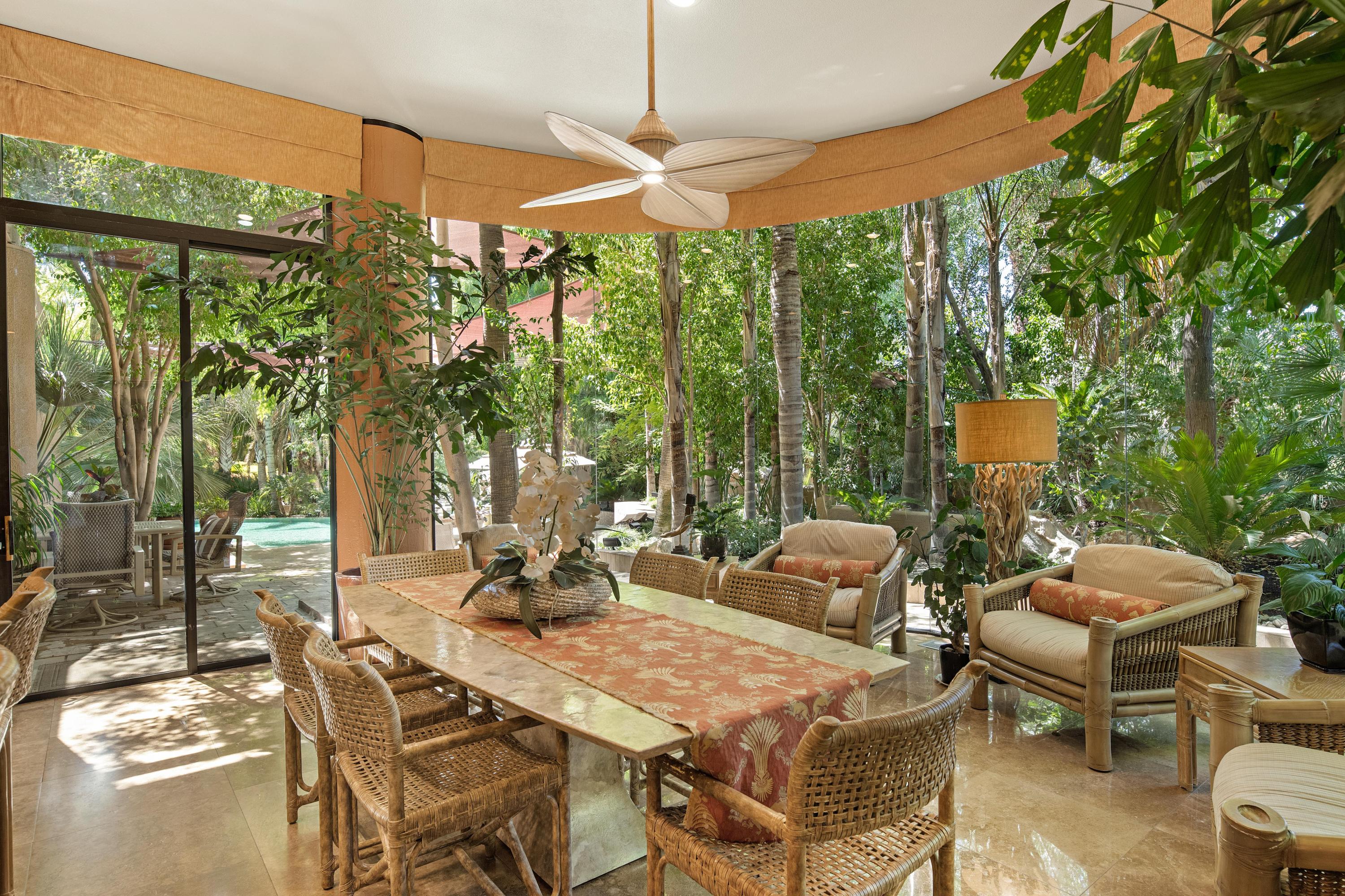3 Mozart Lane Rancho Mirage, CA 92270 - Photo 10 of 41 a dinning table and chairs in the patio