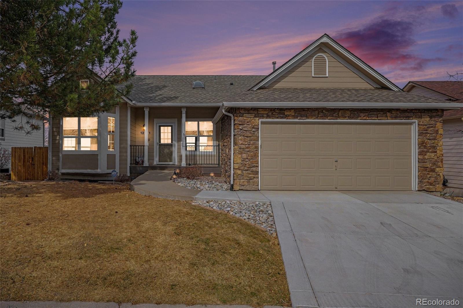 12271 West Chenango Drive Morrison, CO 80465 - Photo 1 of 37 a front view of a house with yard