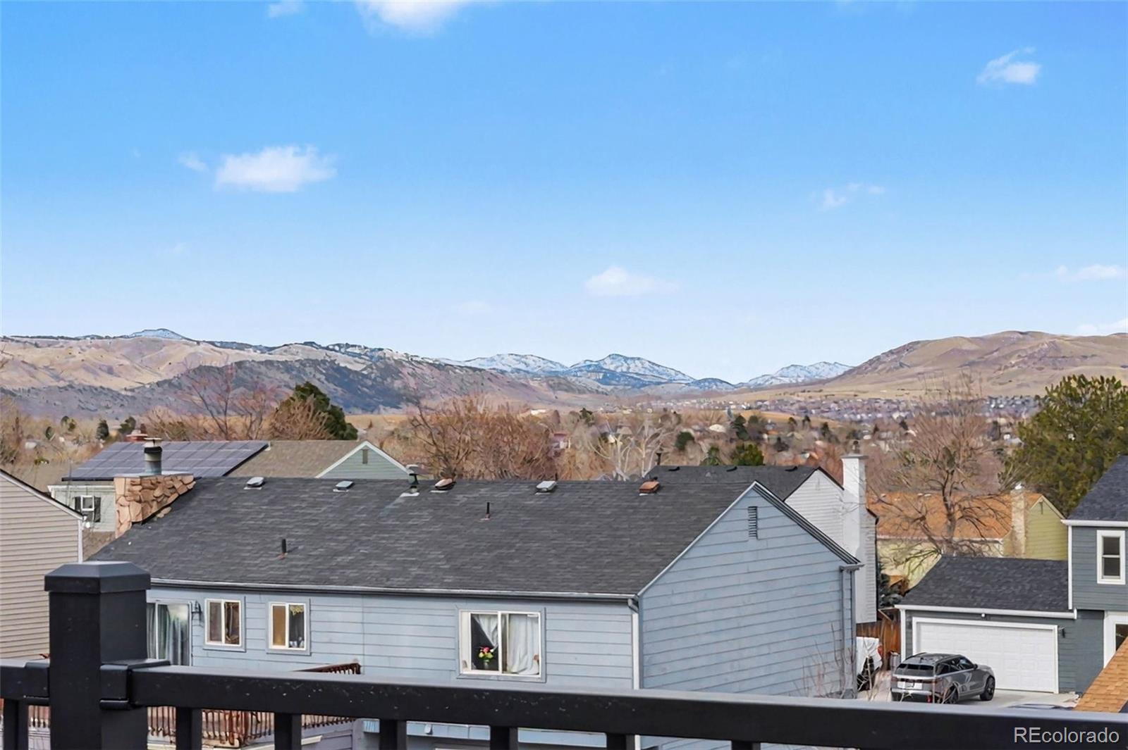 12271 West Chenango Drive Morrison, CO 80465 - Photo 23 of 37 a view of a house with a mountain