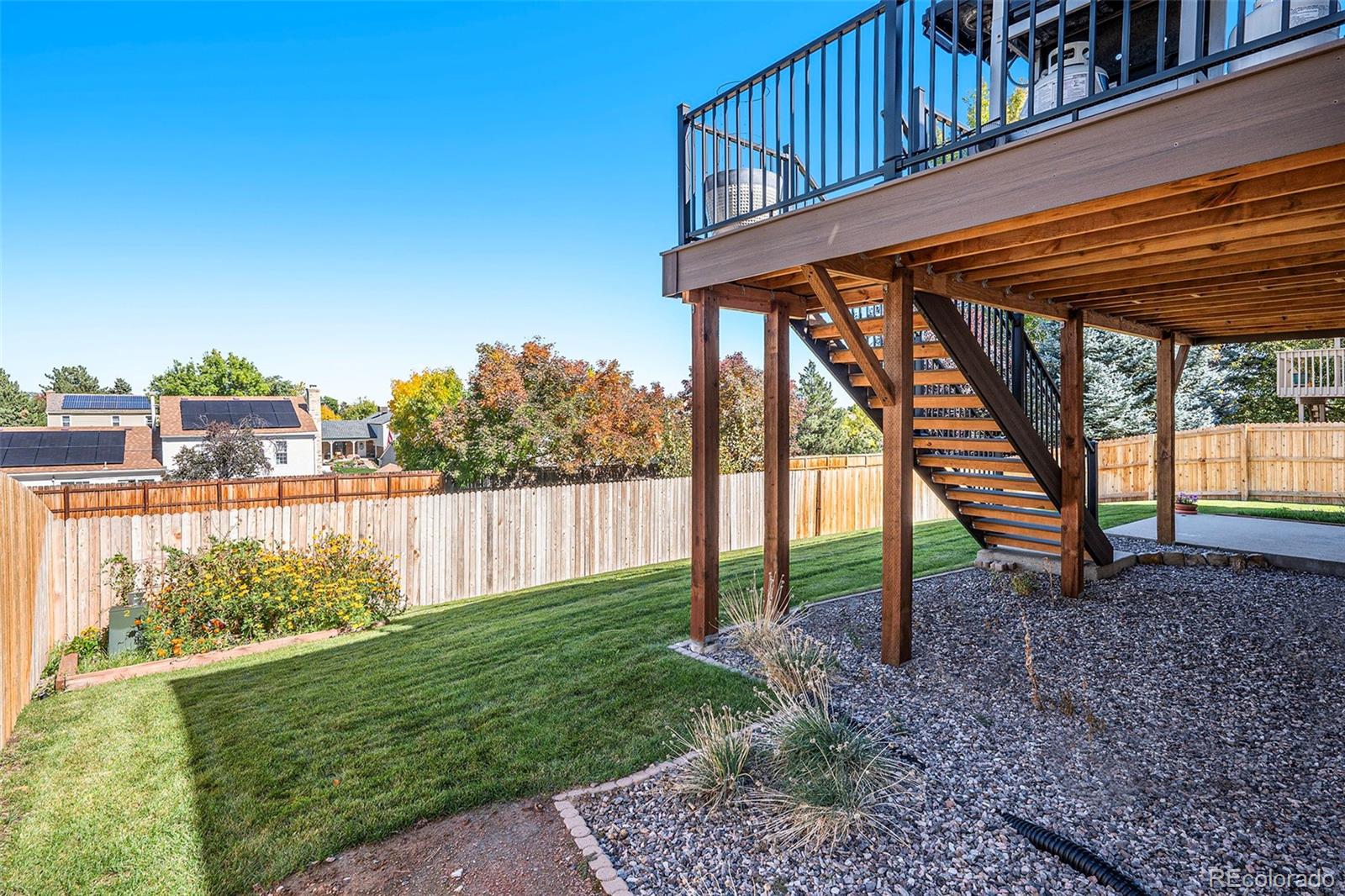 12271 West Chenango Drive Morrison, CO 80465 - Photo 25 of 37 a view of a backyard with a garden
