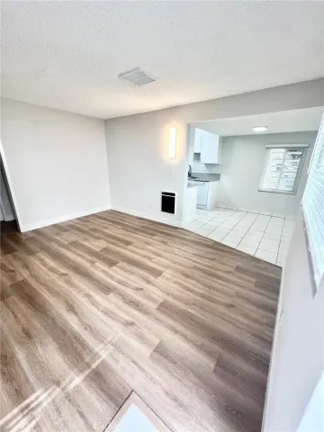 a large white bed in a white room