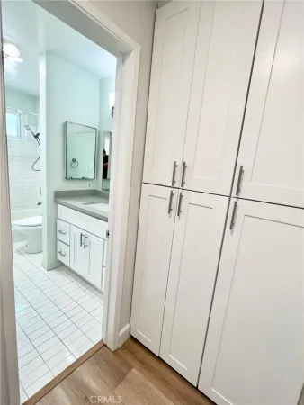 a bathroom with a sink a mirror and a shower