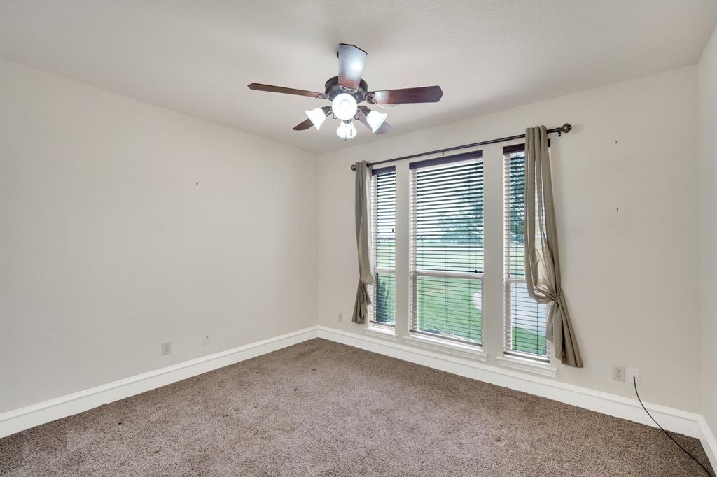 241 Cody Road Ennis, TX 75119 - Photo 23 of 40 1st floor bedroom