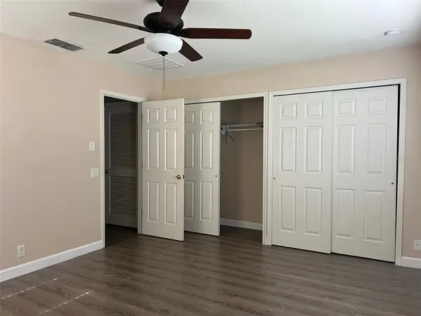 a bathroom with a sink and shower