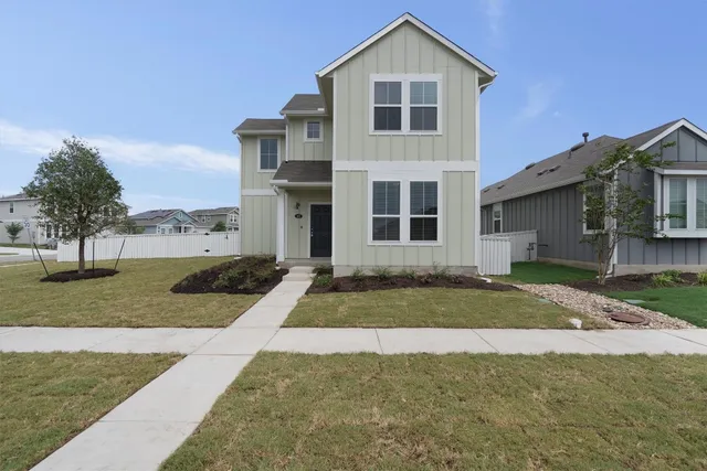 a view of outdoor space yard and front view of a house