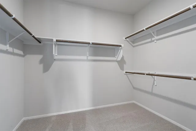 a view of an empty walk in closet