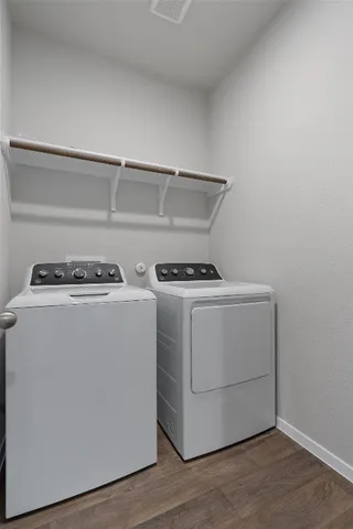 a utility room with washer and dryer