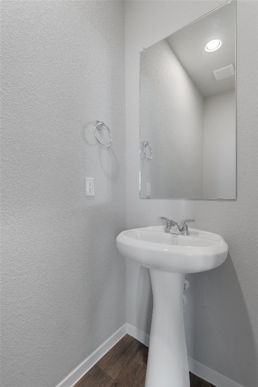 101 Keltic Drive Kyle, TX 78640 - Photo 18 of 29 a bathroom with a sink a mirror and vanity