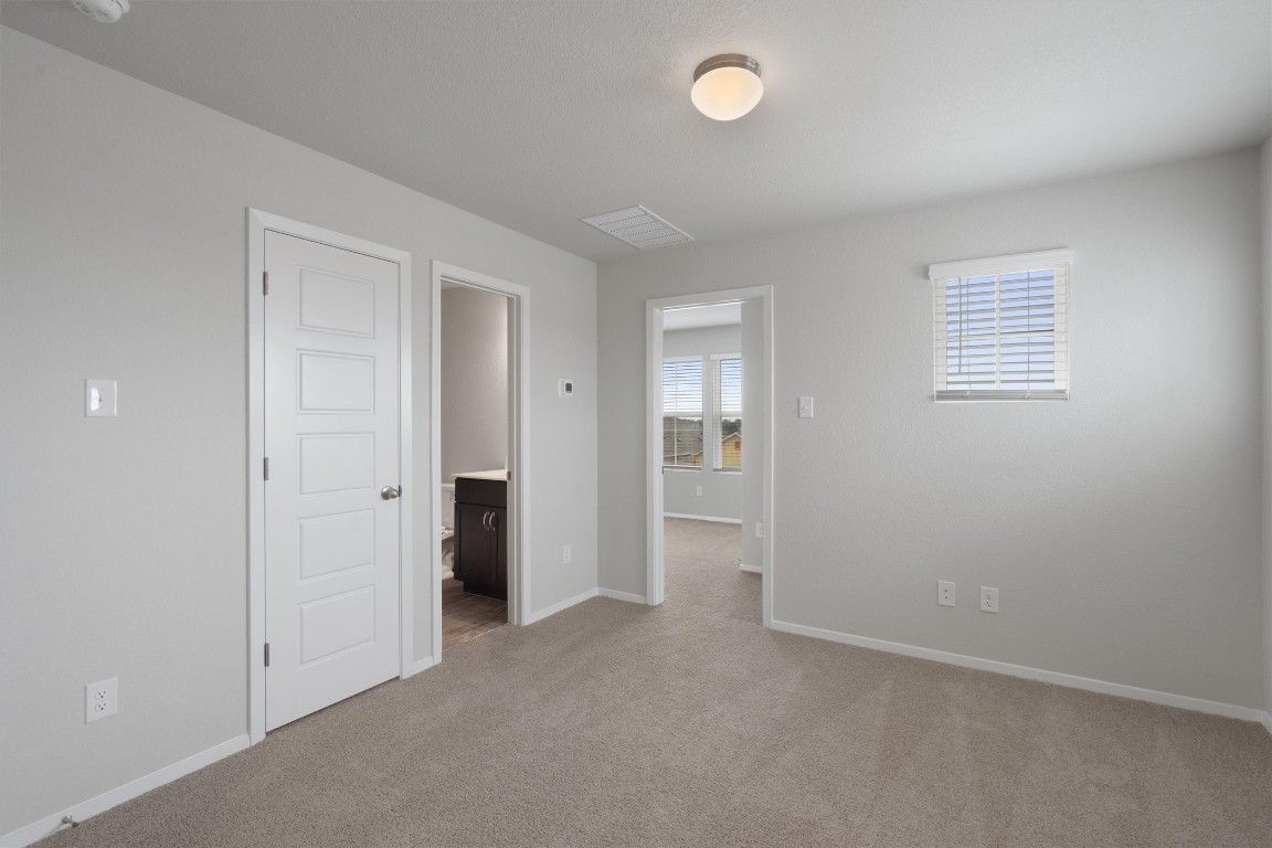 101 Keltic Drive Kyle, TX 78640 - Photo 19 of 29 an empty room with closet area