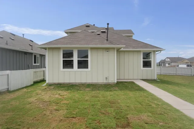 a view of an house with backyard porch and outdoor space