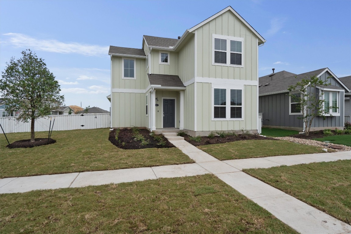 101 Keltic Drive Kyle, TX 78640 - Photo 4 of 29 a view of a yard in front of a house