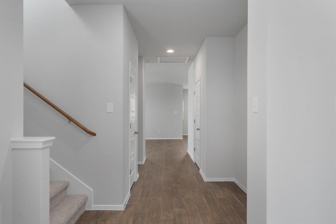 101 Keltic Drive Kyle, TX 78640 - Photo 6 of 29 a view of a hallway with staircase