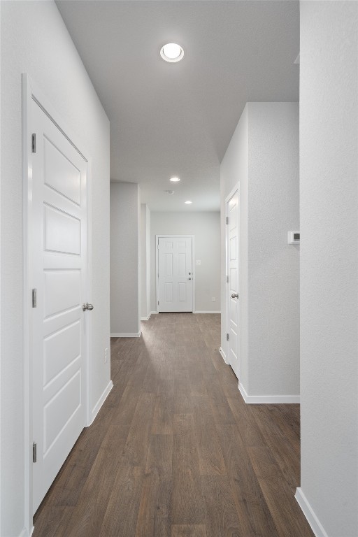 101 Keltic Drive Kyle, TX 78640 - Photo 7 of 29 a view of a hallway with wooden floor