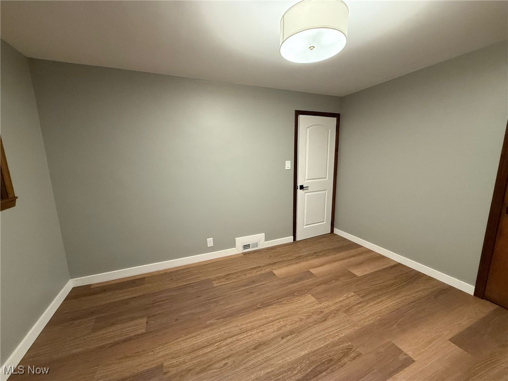 4017 Kibler Toot Road Southwest Warren, OH 44481 - Photo 8 of 30 Unfurnished room with light hardwood / wood-style flooring