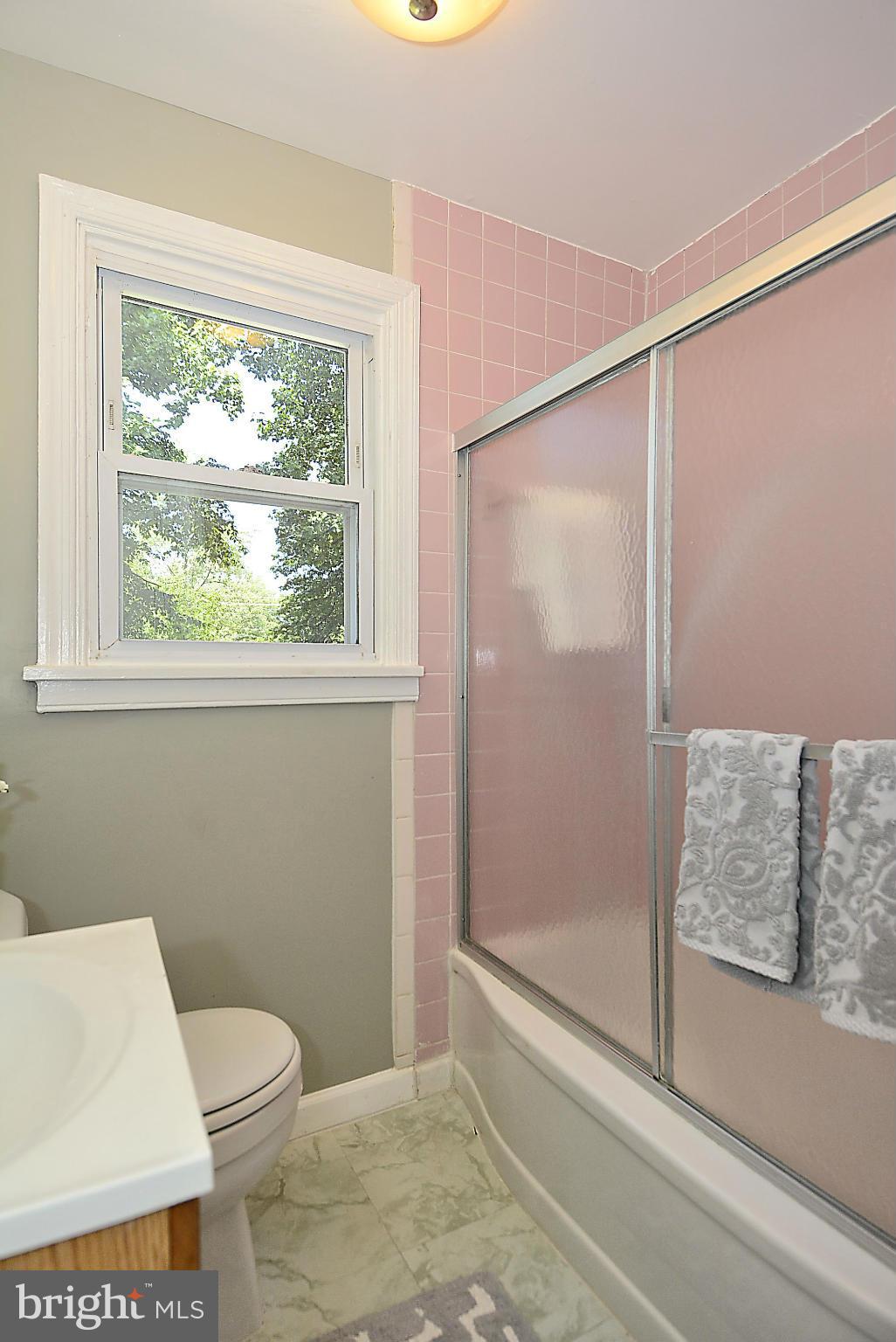 2709 Newton Street Silver Spring, MD 20902 - Photo 12 of 25 a bathroom with a toilet and a shower