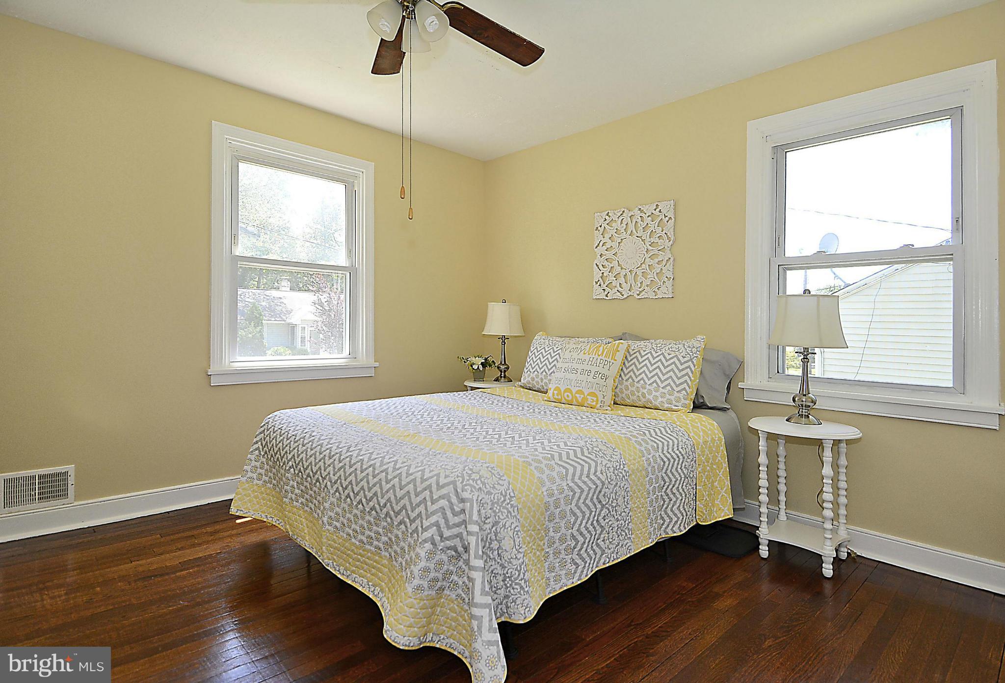 2709 Newton Street Silver Spring, MD 20902 - Photo 14 of 25 a bedroom with a bed and a window
