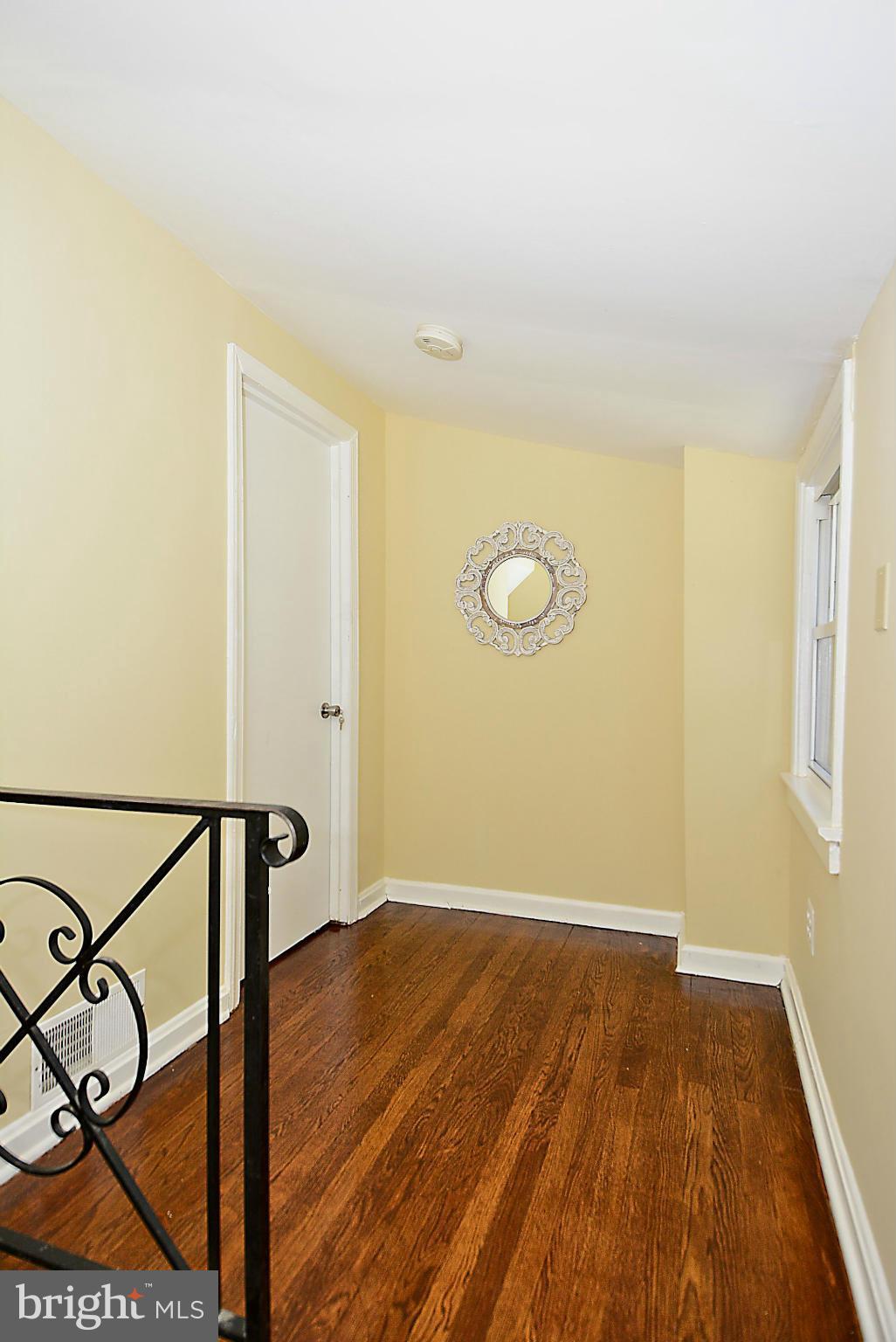2709 Newton Street Silver Spring, MD 20902 - Photo 18 of 25 a view of an empty room with wooden floor