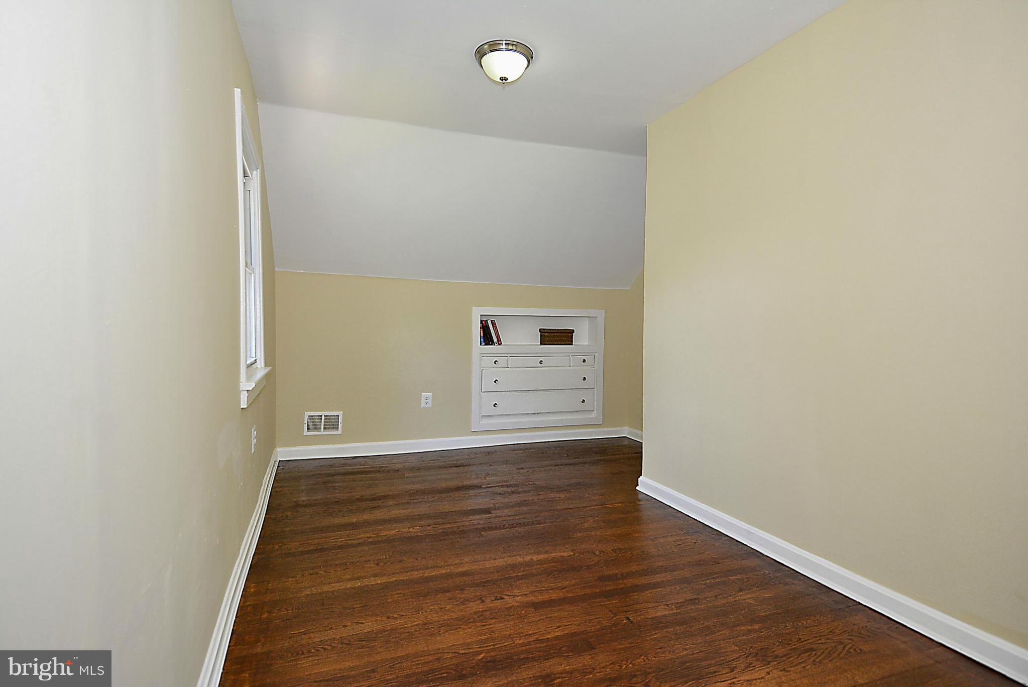 2709 Newton Street Silver Spring, MD 20902 - Photo 22 of 25 a view of a hallway with wooden floor