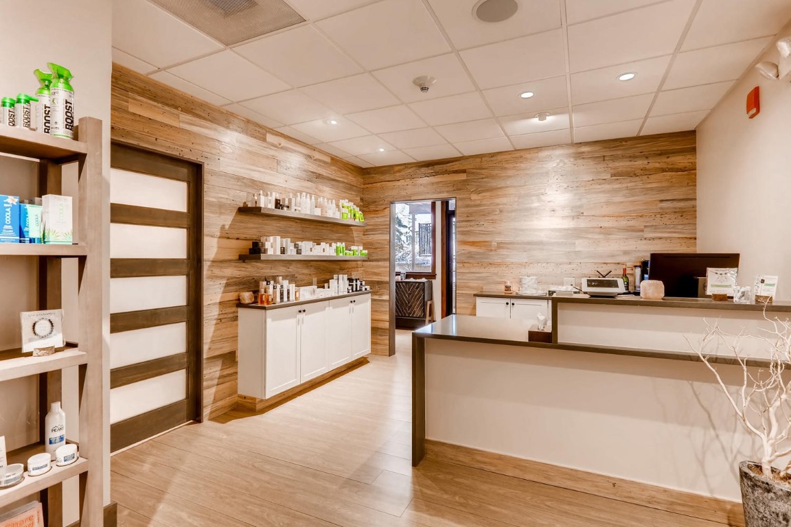 640 Village Road, Unit 4320 Breckenridge, CO 80424 - Photo 15 of 39 a large white kitchen with stainless steel appliances kitchen island granite countertop a large counter top and a stove