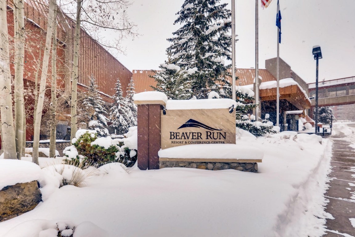 640 Village Road, Unit 4320 Breckenridge, CO 80424 - Photo 20 of 39 a street sign on a pole on a road