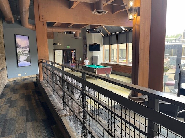 640 Village Road, Unit 4320 Breckenridge, CO 80424 - Photo 36 of 39 a view of a room with wooden floor and windows