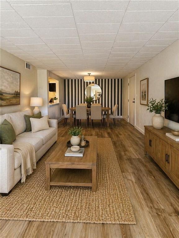 321 Ridge Point Circle, Unit B13 Bridgeville, PA 15017 - Photo 5 of 26 AI STAGED LIVING ROOM/ DINING ROOM