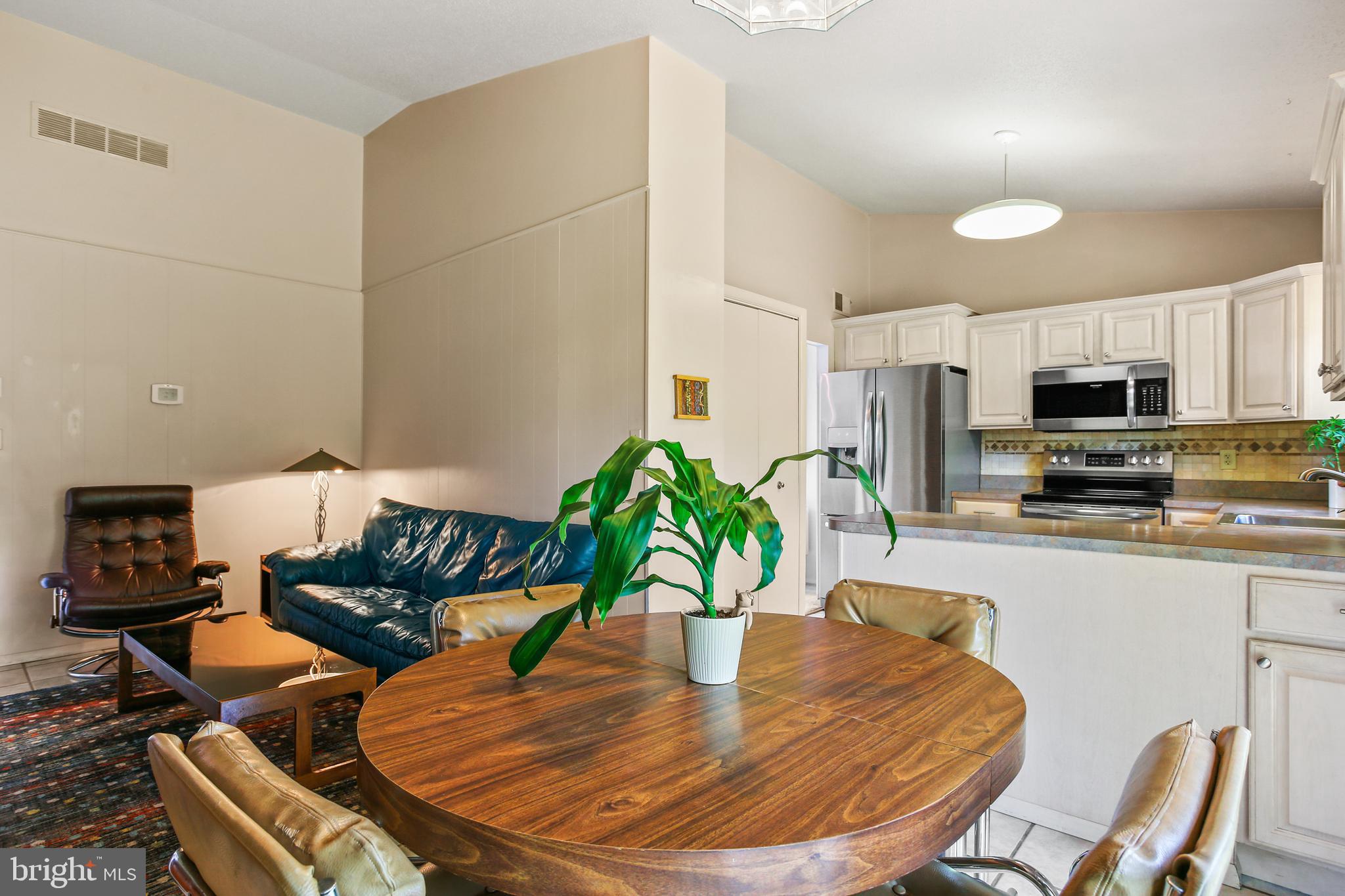 8216 Scotts Level Road Pikesville, MD 21208 - Photo 13 of 42 Kitchen opens to Family Room