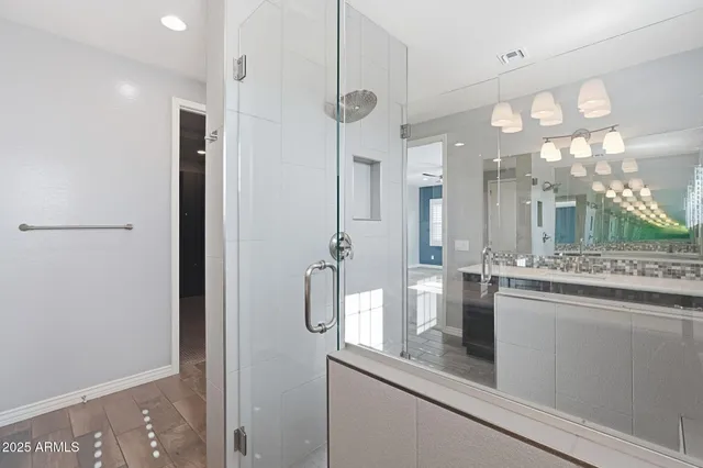 a kitchen with stainless steel appliances a refrigerator and a sink