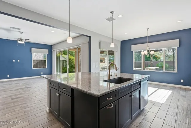 a kitchen with sink and window