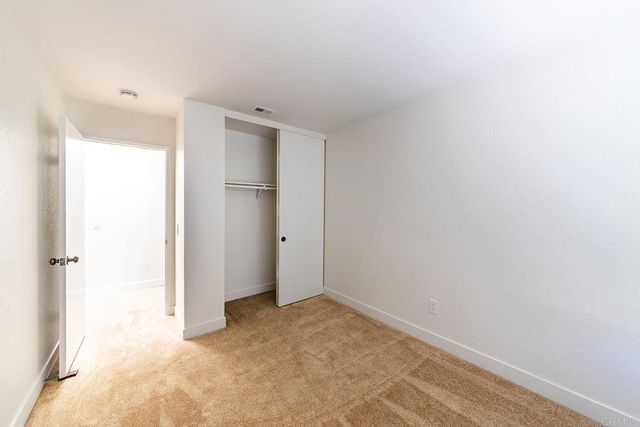 a bathroom with a shower and toilet