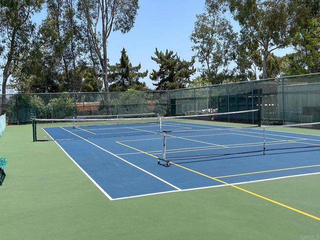 a bedroom with a bed and furniture
