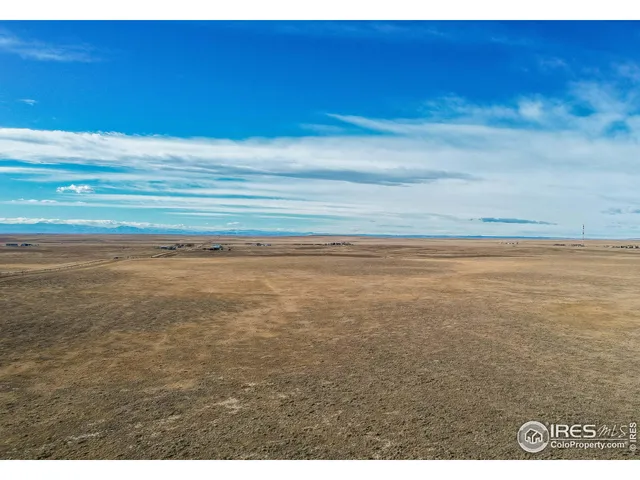 a view of beach and an ocean