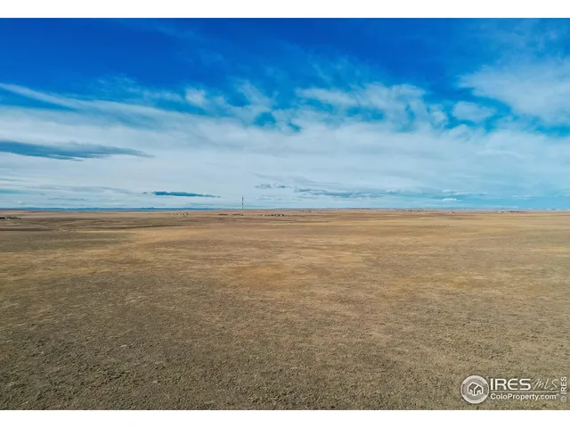 a view of beach and an ocean