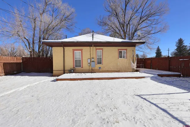 wooden floor with an entryway