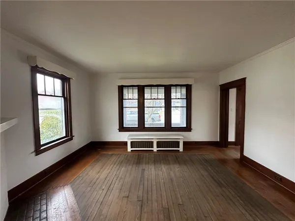 wooden floor and windows in a room