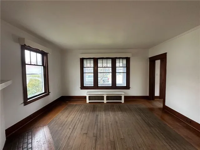 wooden floor and windows in a room