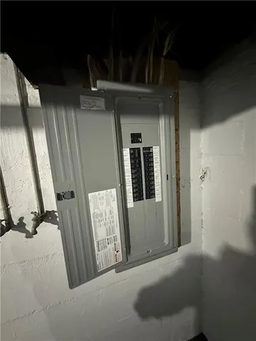 a view of a hallway with a window