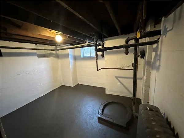 a bathroom with a sink and shower