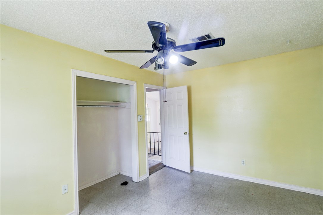 2402 Wilkes Street Bryan, TX 77803 - Photo 11 of 24 a view of a ceiling fan in a room