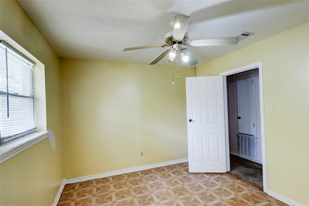 2402 Wilkes Street Bryan, TX 77803 - Photo 13 of 24 a view of an empty room with a window