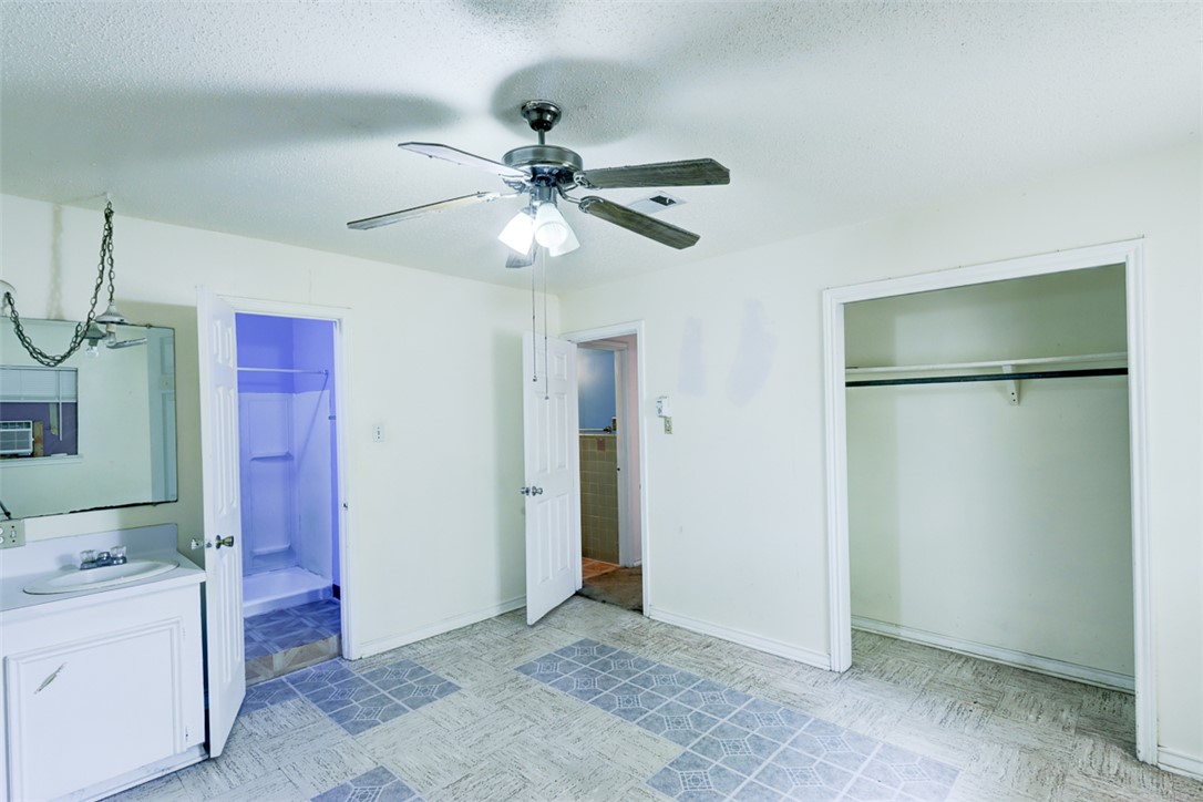 2402 Wilkes Street Bryan, TX 77803 - Photo 16 of 24 a view of an empty room with a bathroom