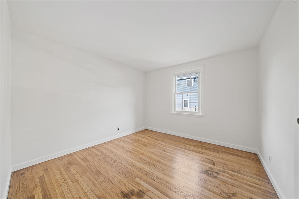 7 Drake Street Braintree, MA 02184 - Photo 20 of 26 a view of empty room with wooden floor