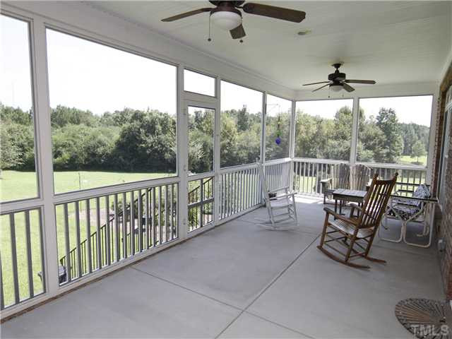 2120 Chad Road Zebulon, NC 27597 - Photo 19 of 25 Screened Porch