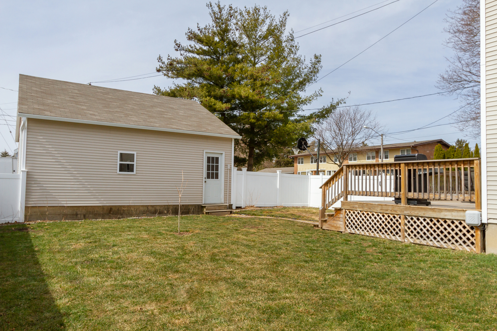 728 Woolf Court Rochelle, IL 61068 - Photo 27 of 31 a front view of a house with a yard