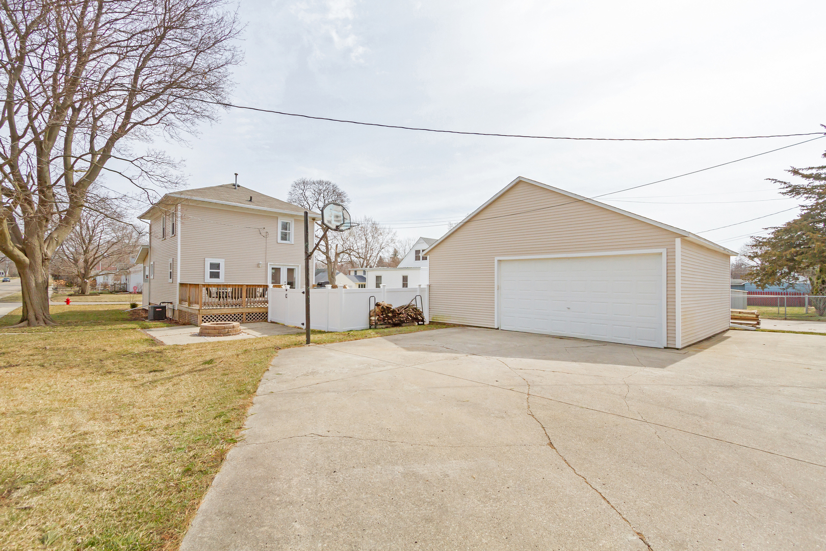 728 Woolf Court Rochelle, IL 61068 - Photo 28 of 31 a view of a house with a snow in the yard