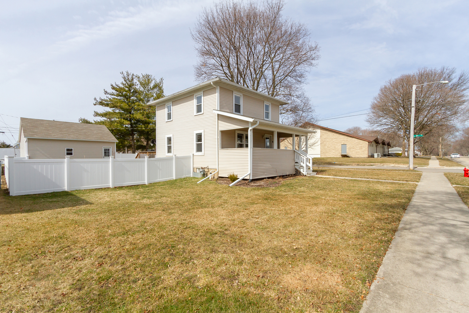 728 Woolf Court Rochelle, IL 61068 - Photo 30 of 31 a front view of a house with a yard
