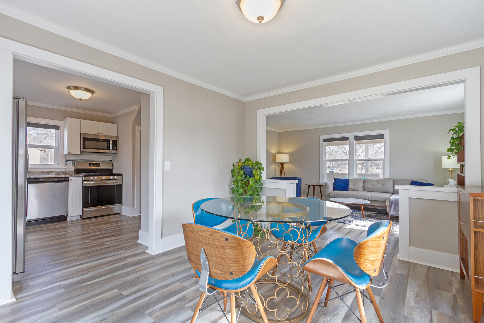 728 Woolf Court Rochelle, IL 61068 - Photo 8 of 31 a view of a dining room with furniture and wooden floor